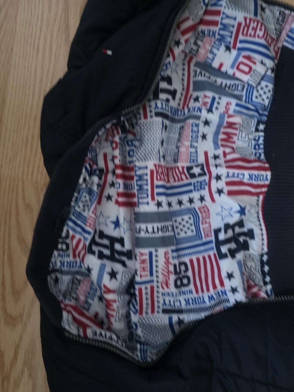 Tommy Hilfiger Black Puffer Jacket with Red & Blue Graphic Lining